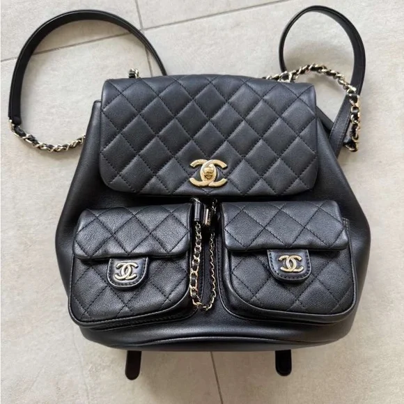 CHANEL Black Quilted Backpack with Gold Accents - Picture 4 of 9